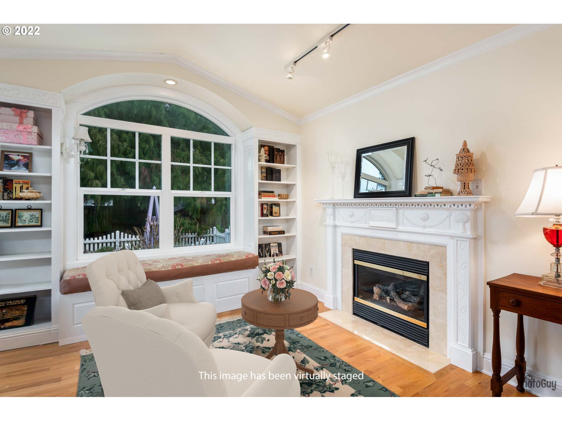 2027 Monterey Lane Eugene, OR 97401 - Photo 18 of 32 a living room with furniture a window and a fireplace