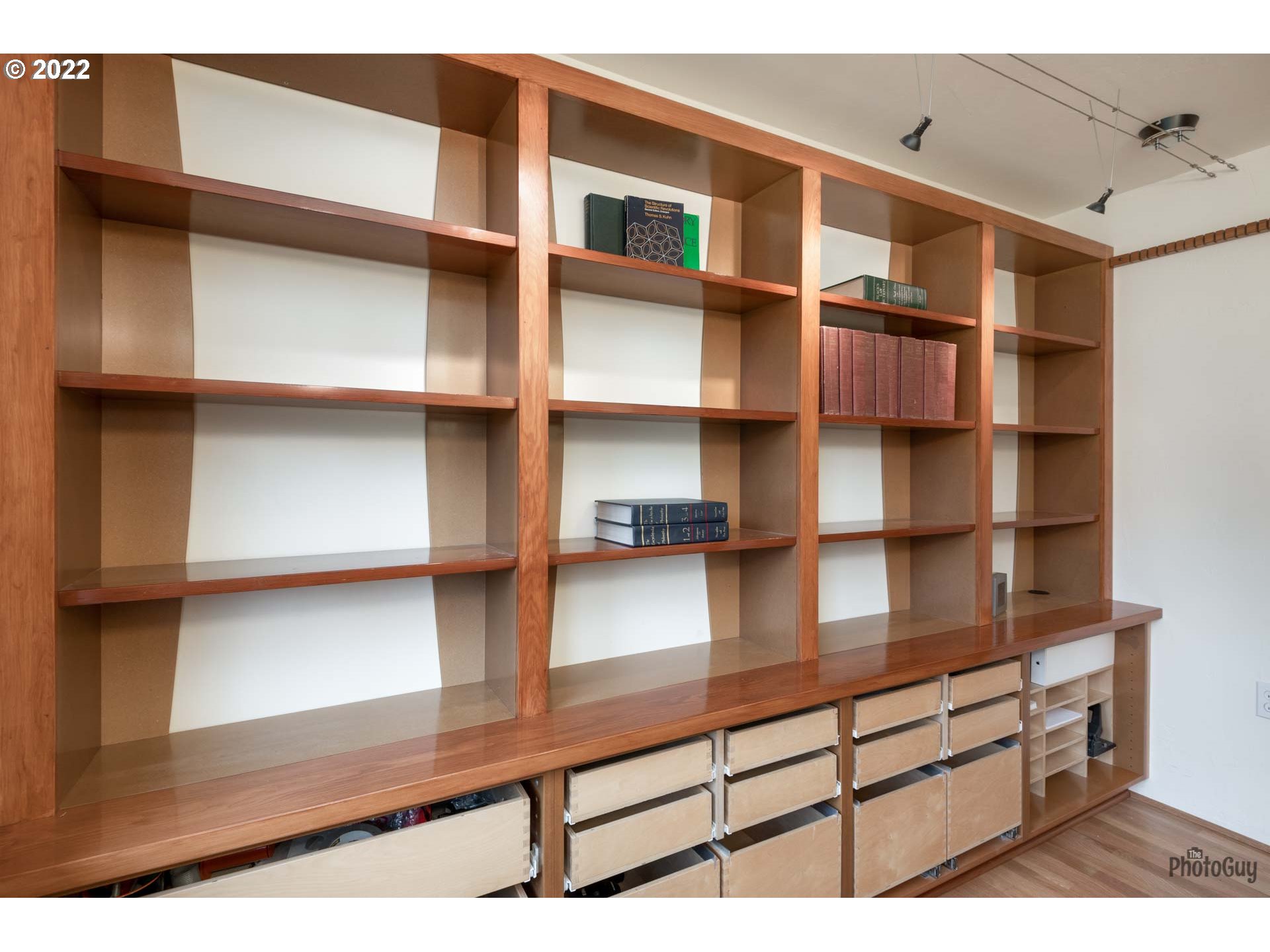 2027 Monterey Lane Eugene, OR 97401 - Photo 27 of 32 a view of walk in closet with clothes and shoes