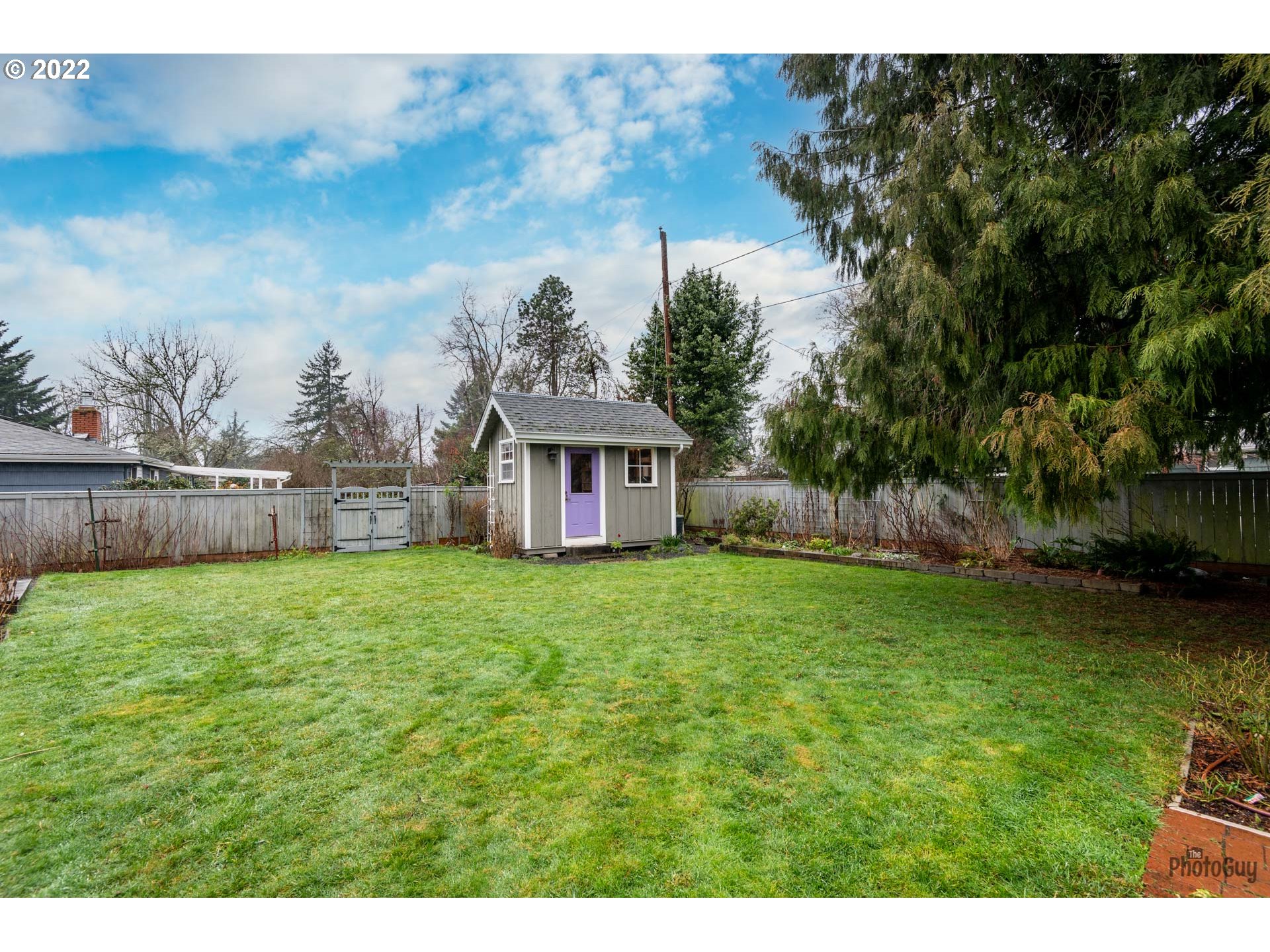 2027 Monterey Lane Eugene, OR 97401 - Photo 31 of 32 a view of a house with backyard and garden