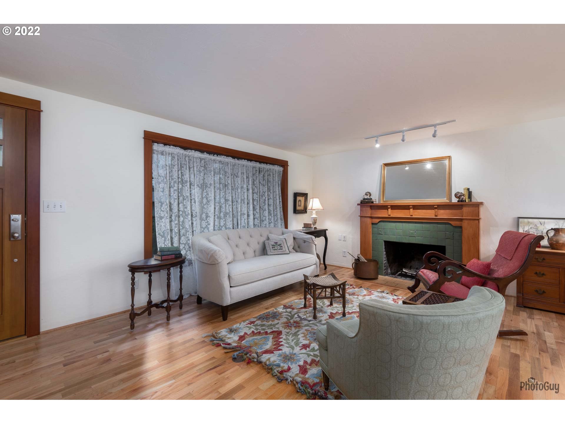 2027 Monterey Lane Eugene, OR 97401 - Photo 5 of 32 a living room with furniture and a fireplace