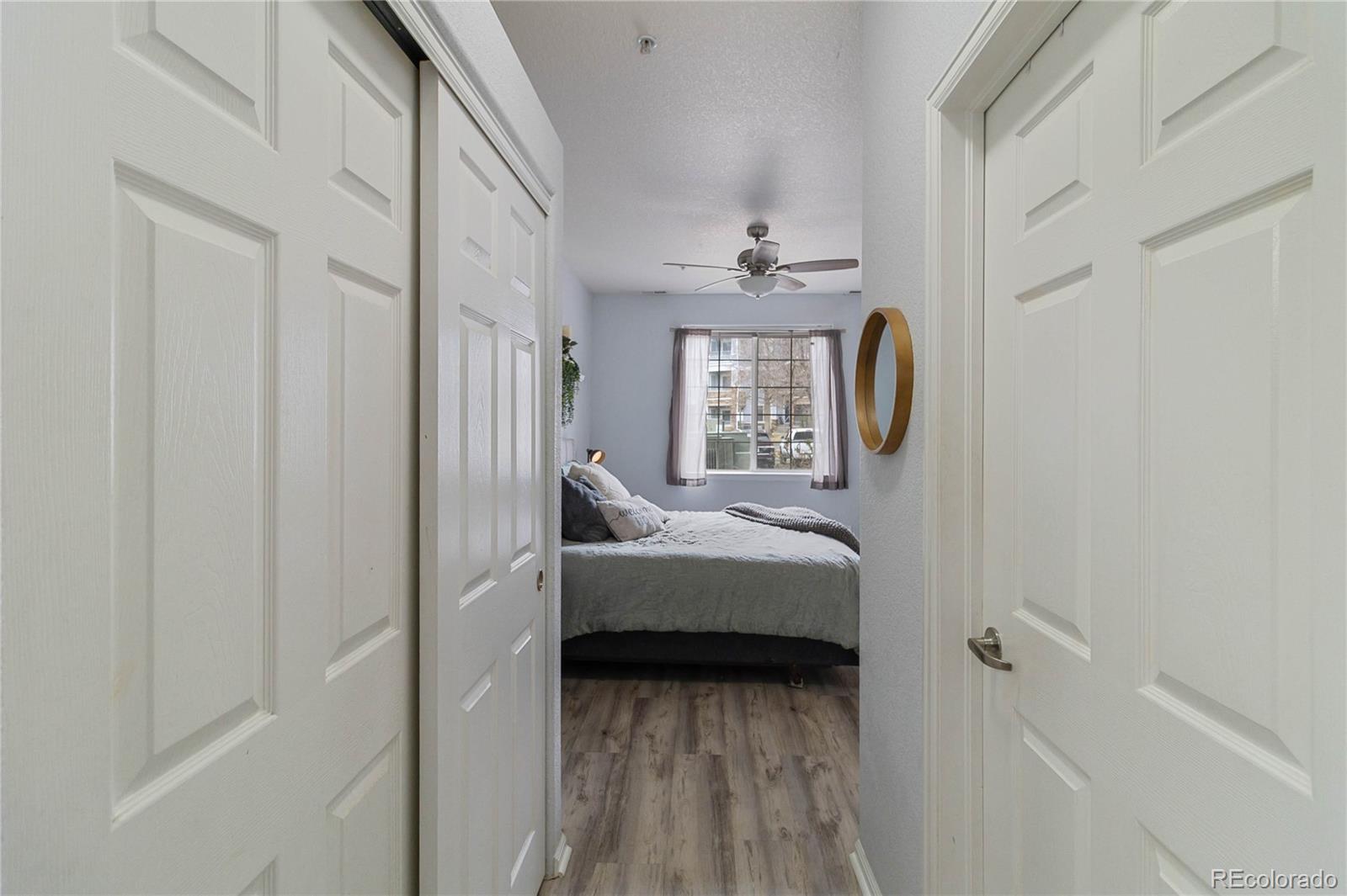 5255 Memphis Street, Unit 702 Denver, CO 80239 - Photo 17 of 30 a bedroom with a bed and a window