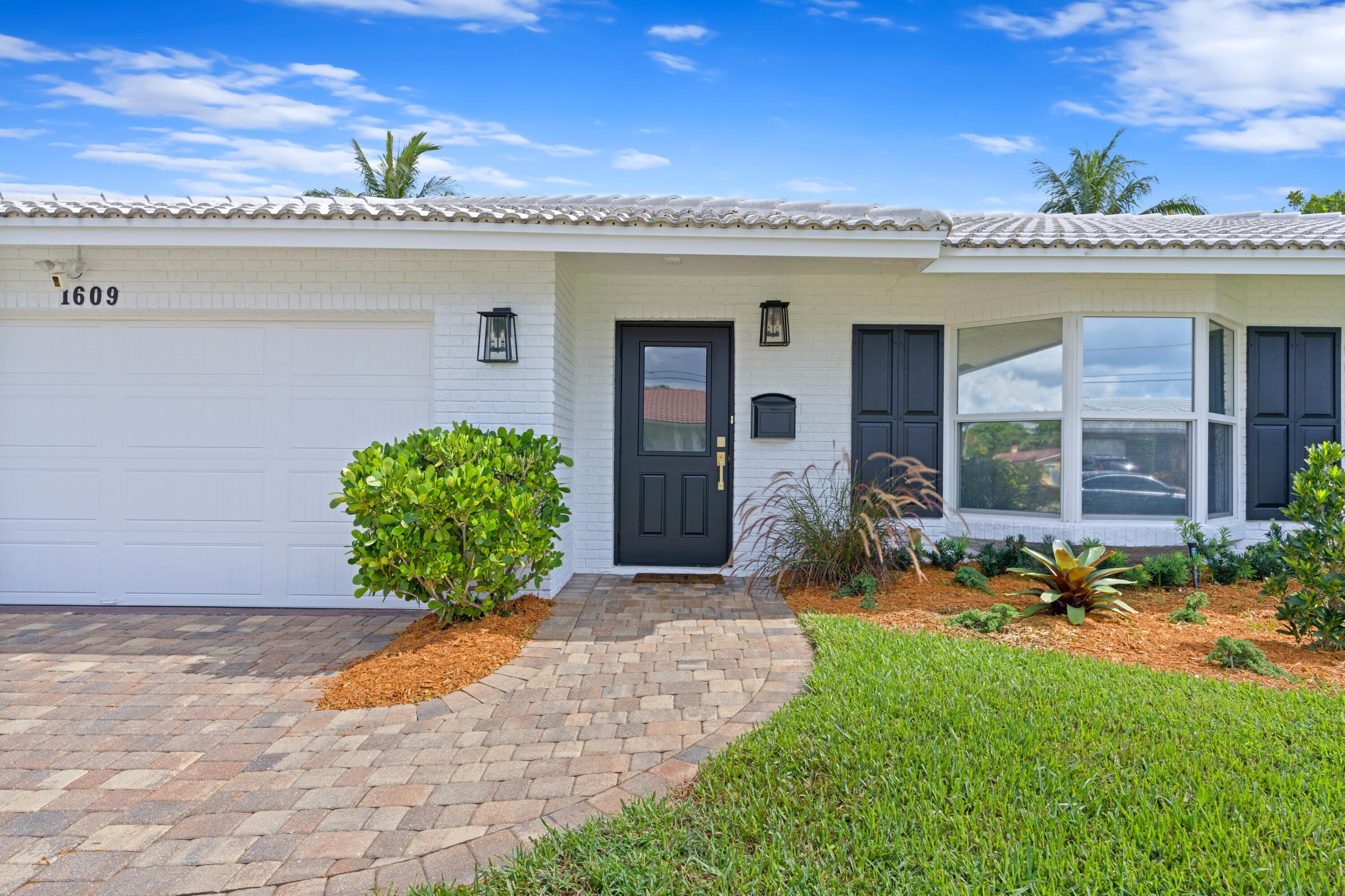 1609 Northwest 8th Street Boca Raton, FL 33486 - Photo 35 of 39 Front