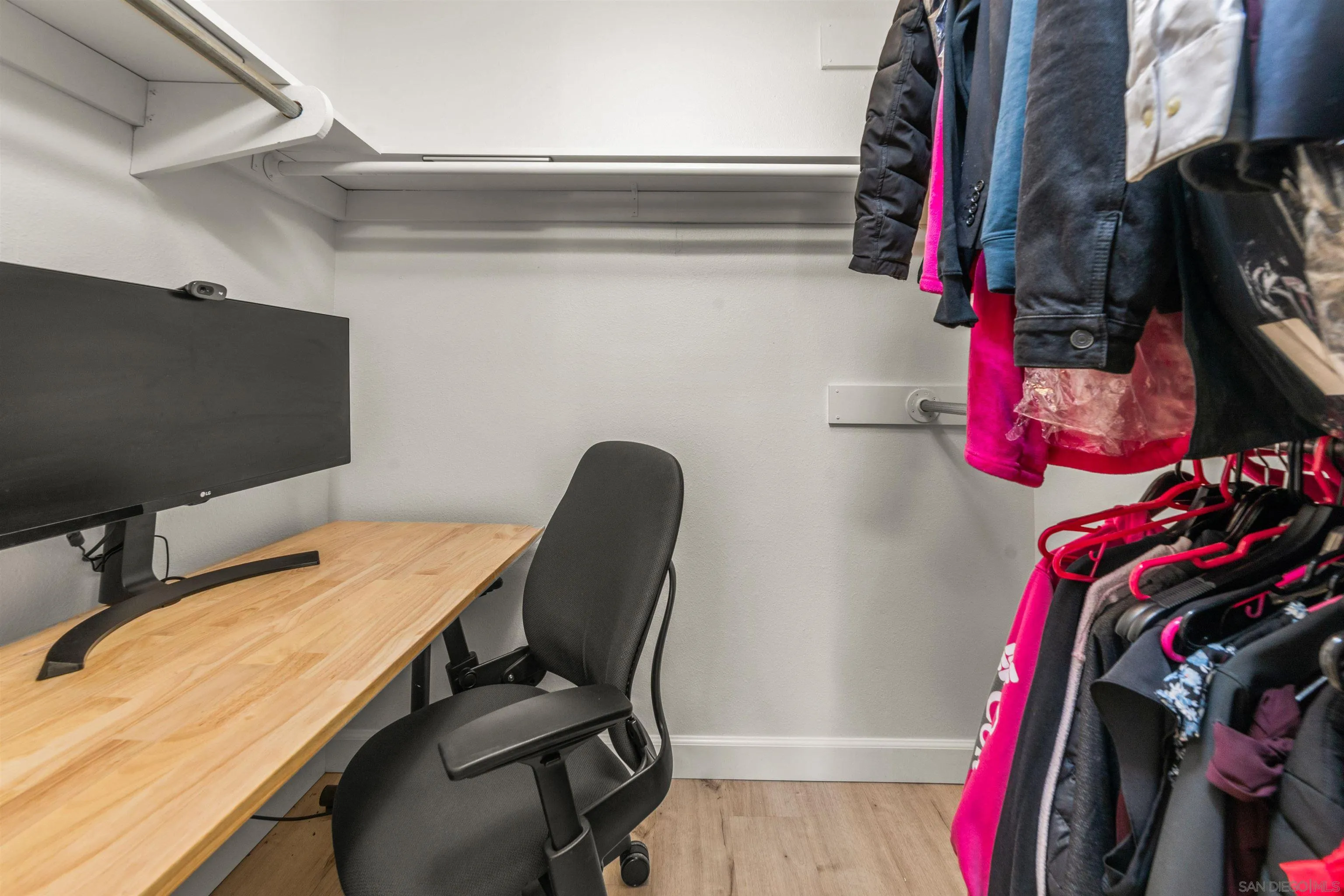 6370 Rancho Mission Road, Unit 913 San Diego, CA 92108 - Photo 13 of 30 a view of walk in closet with clothes and shoes