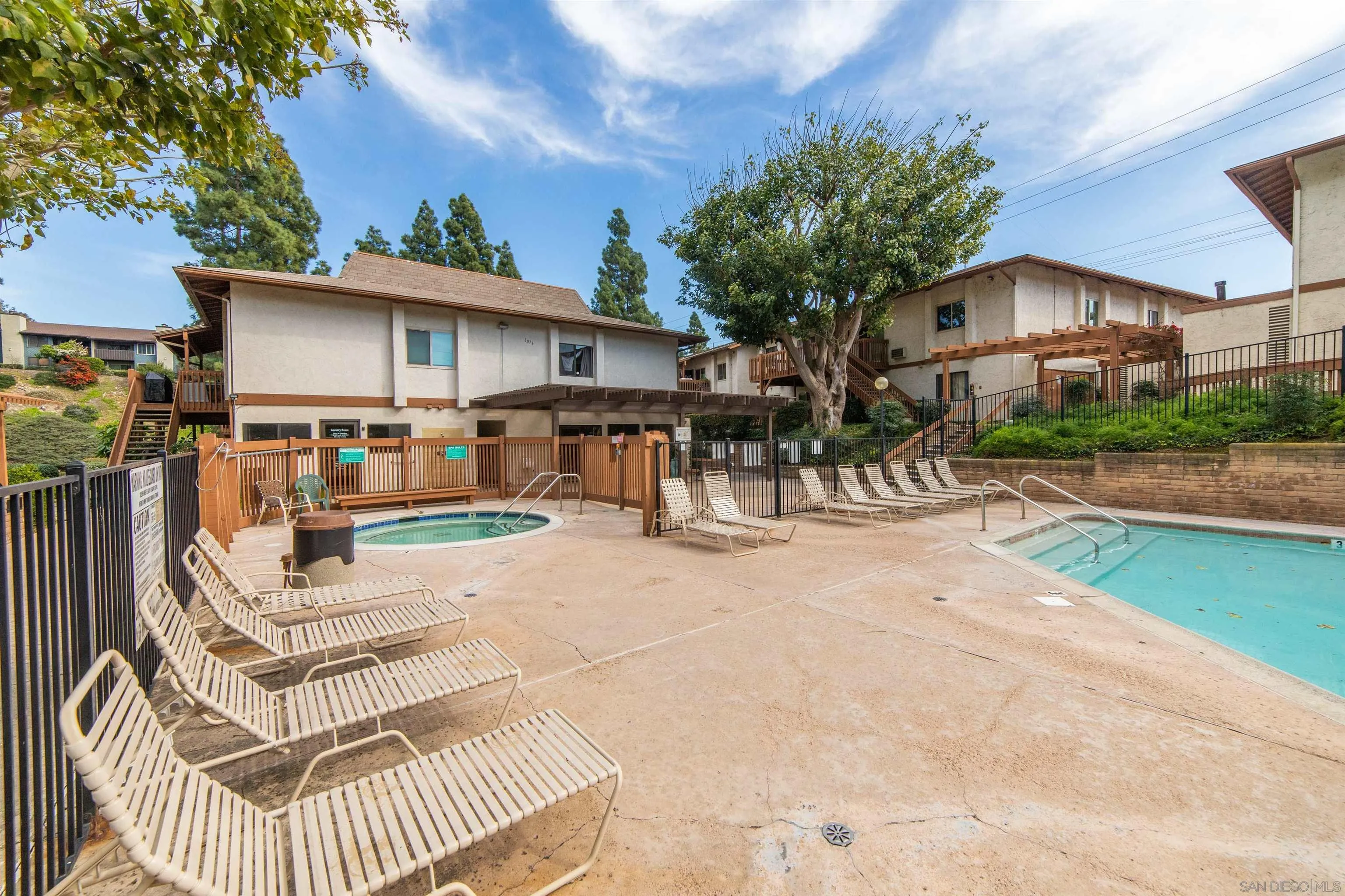 6370 Rancho Mission Road, Unit 913 San Diego, CA 92108 - Photo 21 of 30 a view of a house with a patio