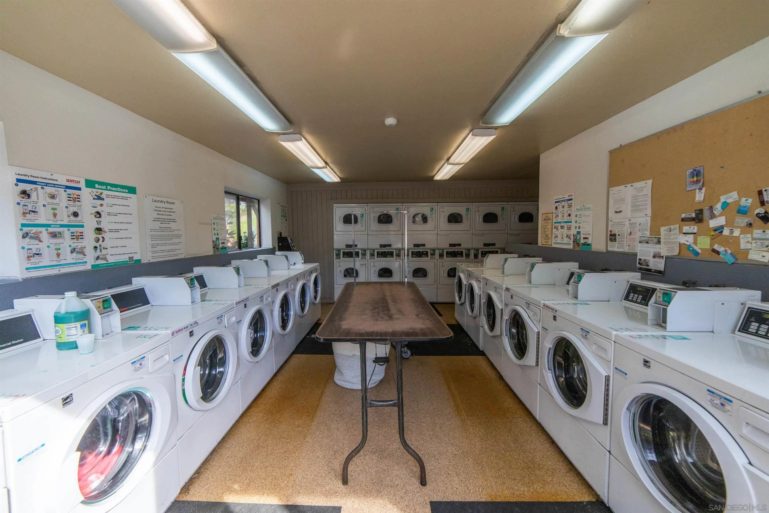 6370 Rancho Mission Road, Unit 913 San Diego, CA 92108 - Photo 24 of 30 a utility room with multiple dryer and washer