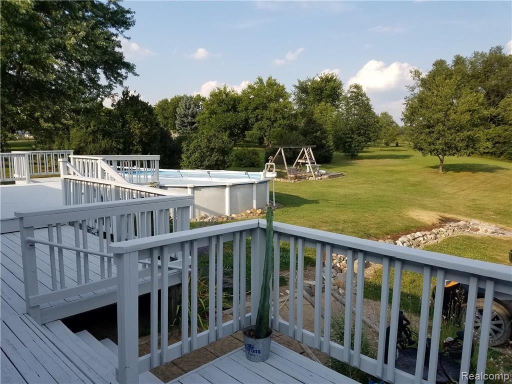 18329 Hickory Ridge Road Fenton, MI 48430 - Photo 18 of 38 Huge deck, great for entertaining!