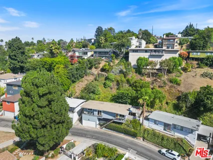 an aerial view of a city with lots of residential buildings