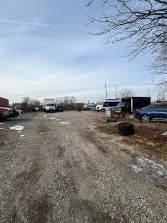 a view of street with car parked