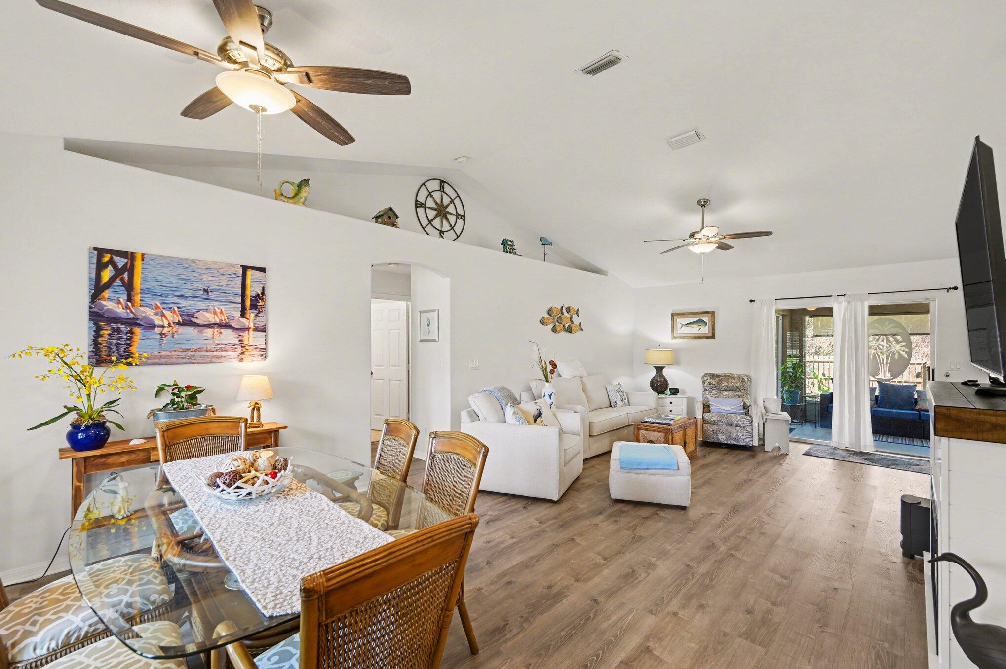 1362 Seahouse Street Sebastian, FL 32958 - Photo 11 of 28 a living room with furniture and wooden floor