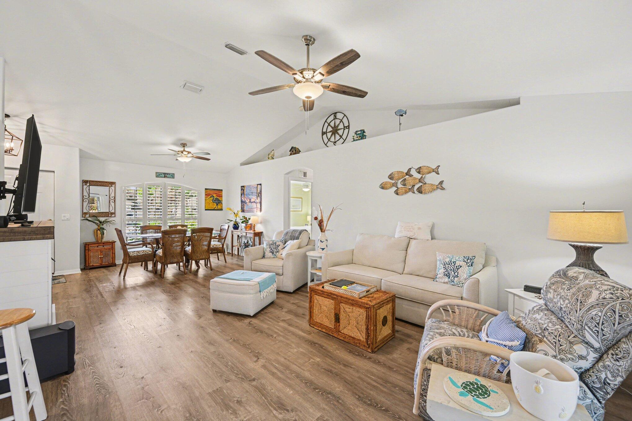 1362 Seahouse Street Sebastian, FL 32958 - Photo 14 of 28 a living room with furniture and wooden floor