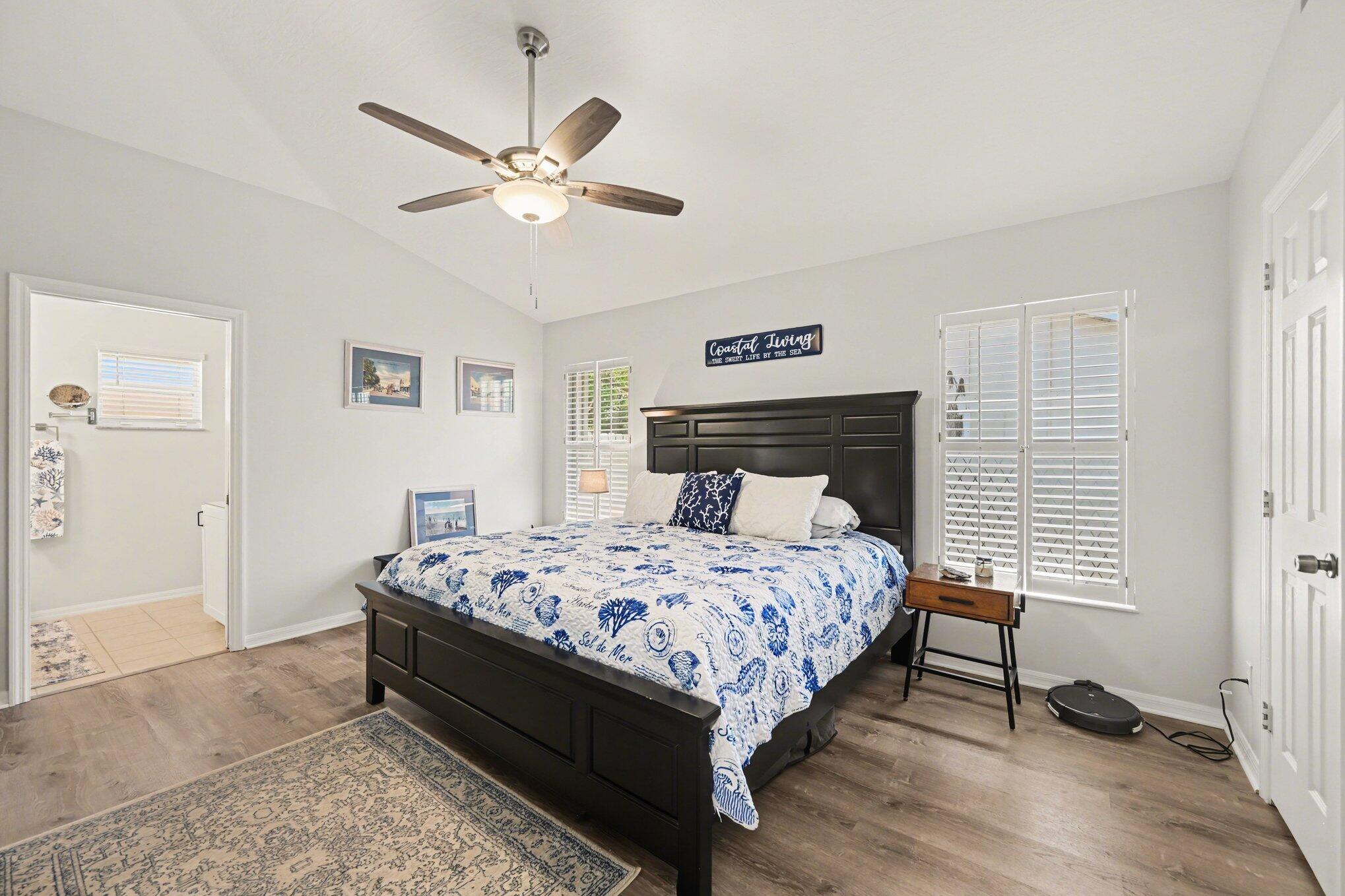 1362 Seahouse Street Sebastian, FL 32958 - Photo 15 of 28 a bedroom with a bed and window
