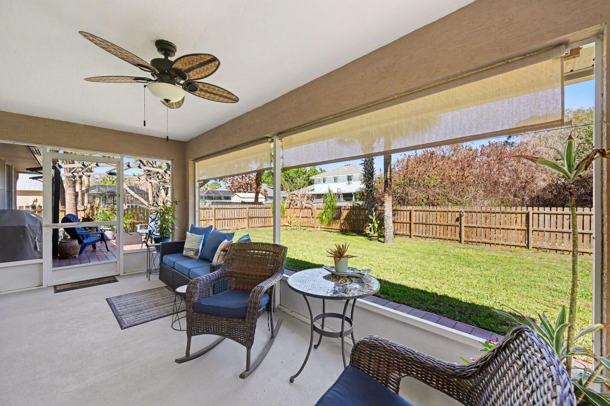 1362 Seahouse Street Sebastian, FL 32958 - Photo 24 of 28 a living room with furniture and a large window