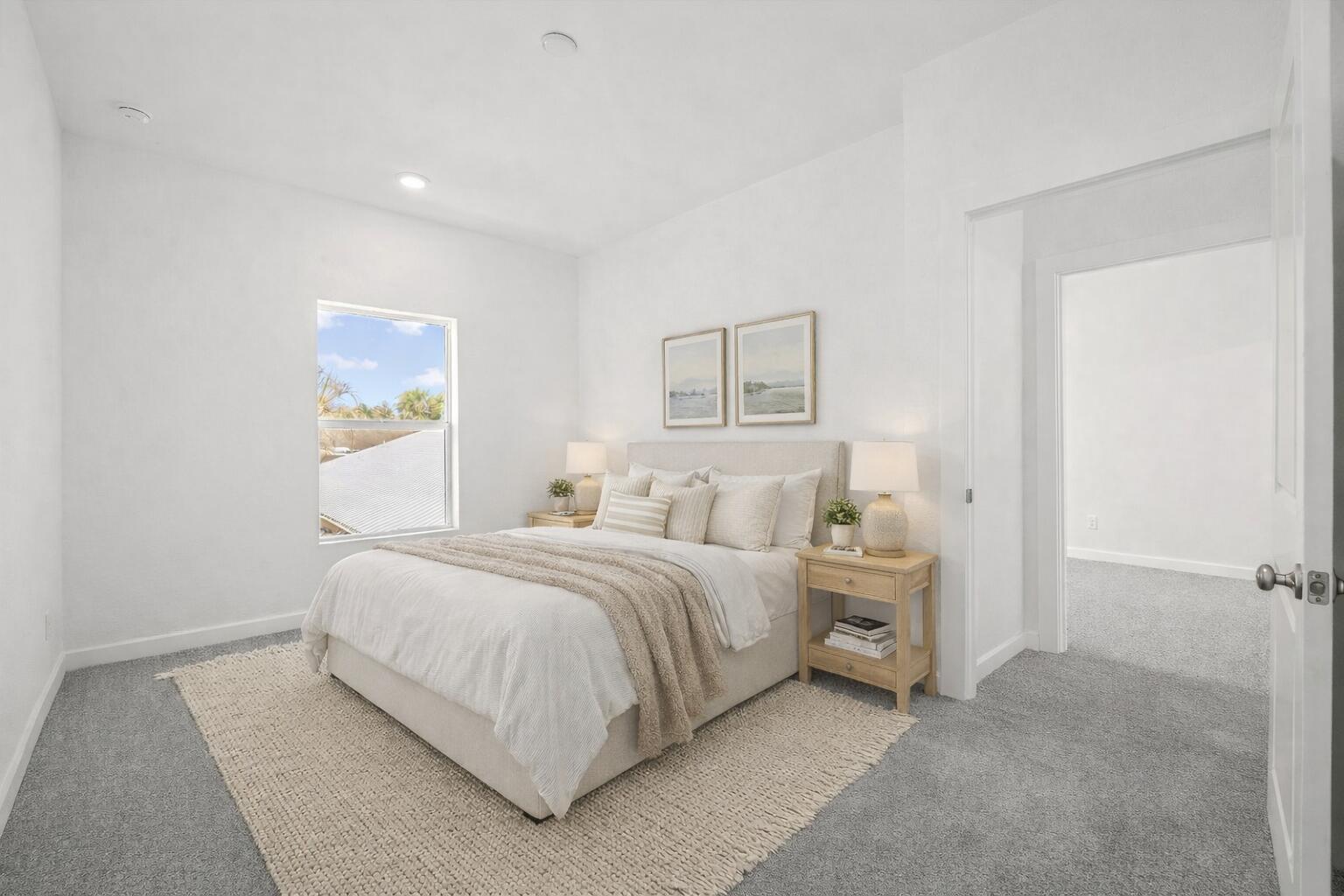 2575 Southeast Bonita Street Stuart, FL 34997 - Photo 16 of 17 a bedroom with a bed and a painting on the wall