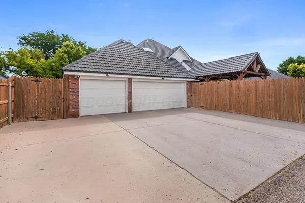 a front view of house with a garage