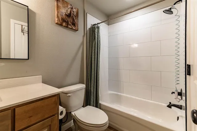 a bedroom with bed and a window