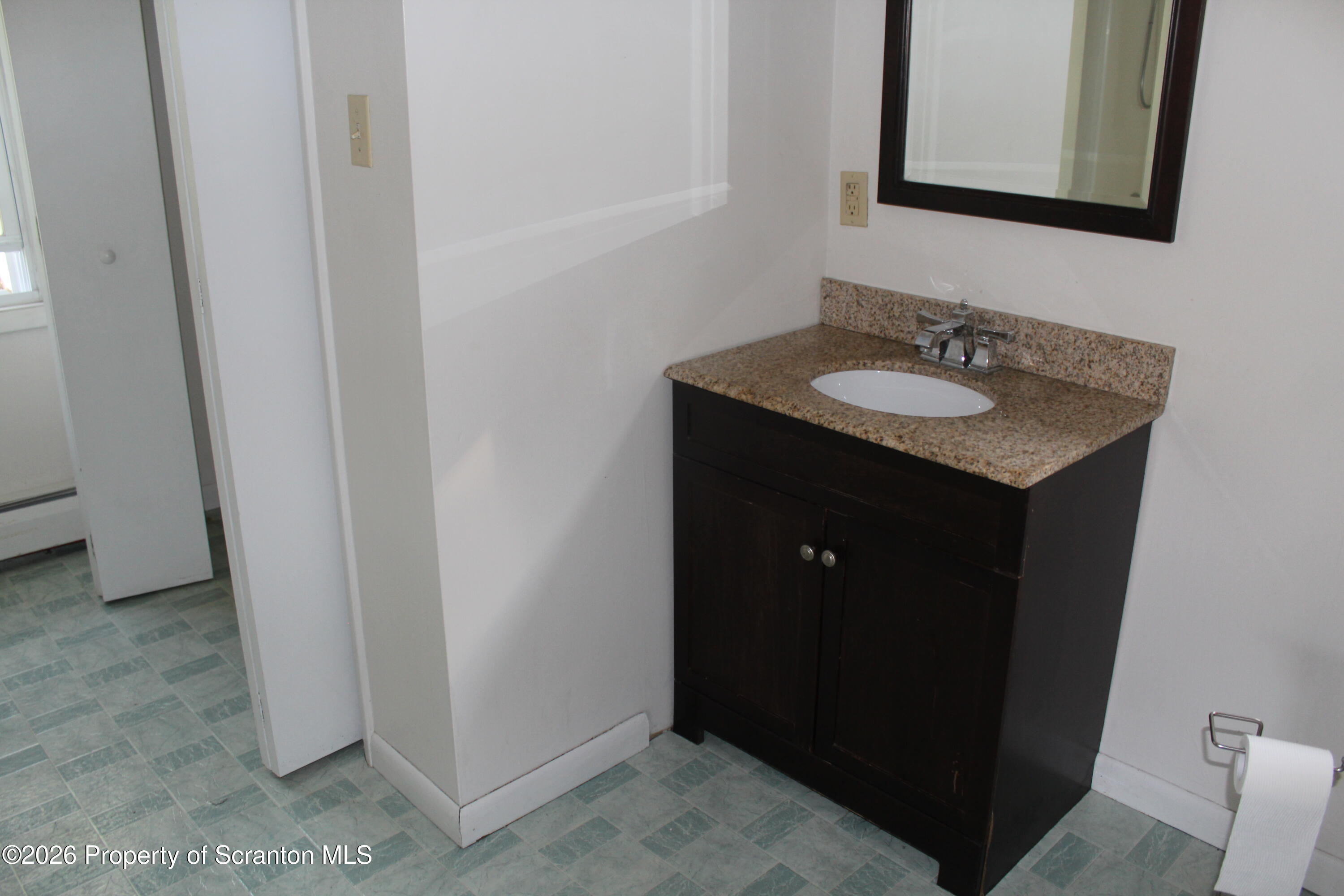 1608 Prospect Avenue Scranton, PA 18505 - Photo 17 of 30 a bathroom with a sink vanity and mirror