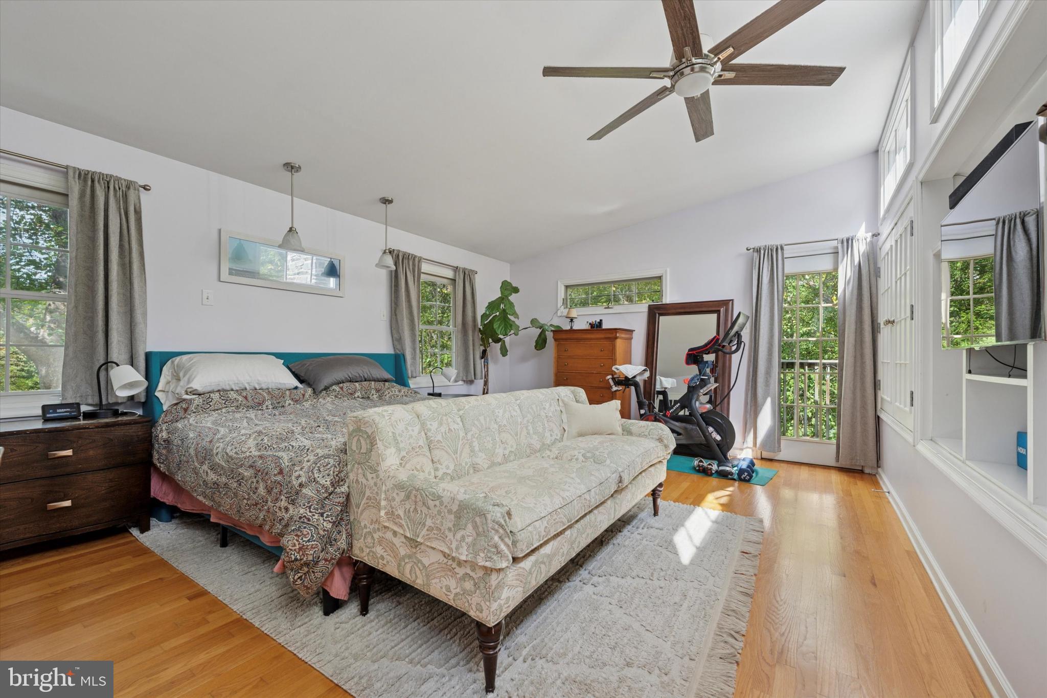 808 Berwyn Baptist Road Devon, PA 19333 - Photo 13 of 26 a bed room with a bed window and a flat tv screen