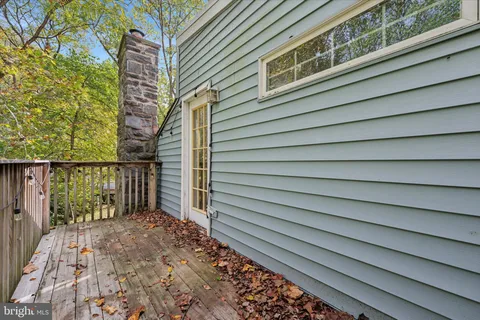 a view of a balcony with a pot