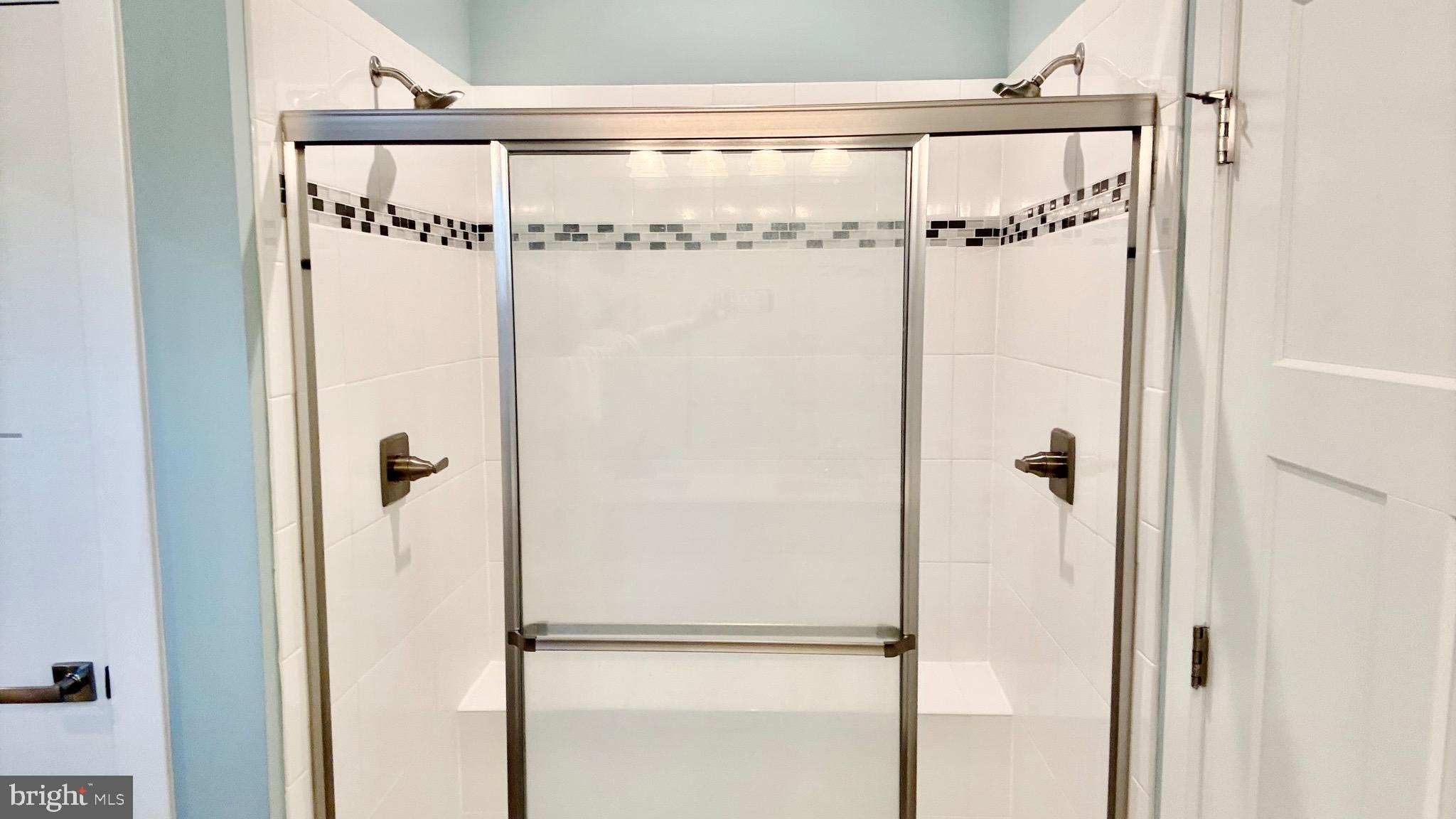 16 Thornton Drive Ocean View, DE 19970 - Photo 14 of 31 Walk-in Roman Shower w/ Dual Heads & Tiled Seat