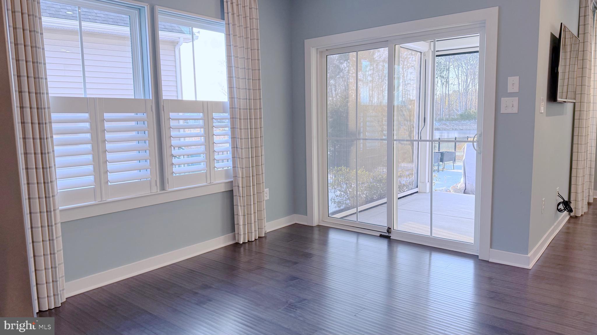 16 Thornton Drive Ocean View, DE 19970 - Photo 7 of 31 Eat-in Dining area, slider leads to screened porch