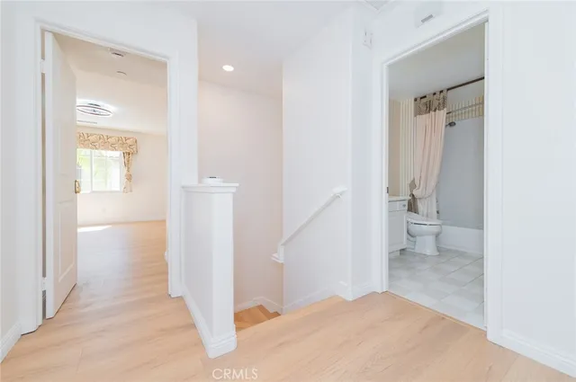 a bathroom with a sink a toilet and a bathtub