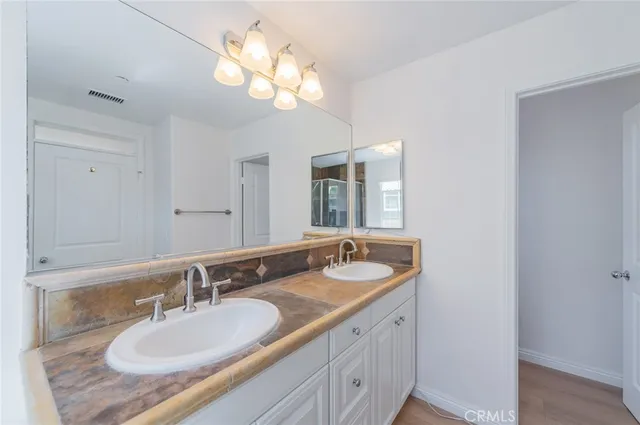 a bathroom with a shower and a bathtub