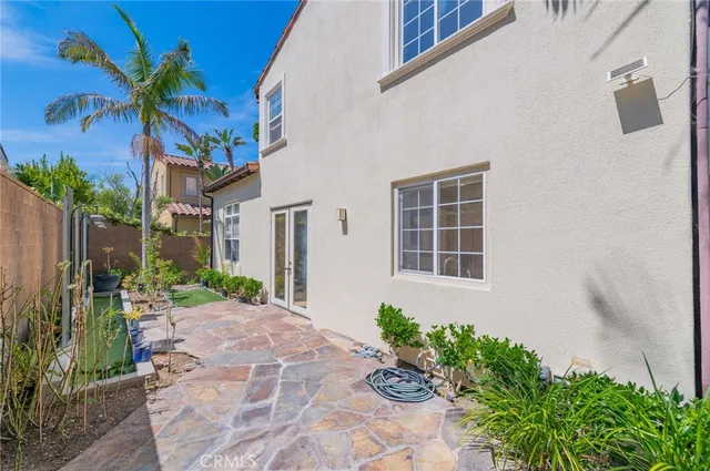 a view of a brick house with a yard