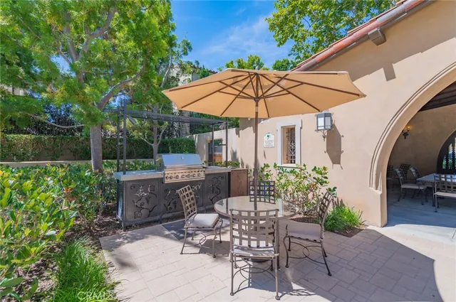 a dining room with furniture and a window