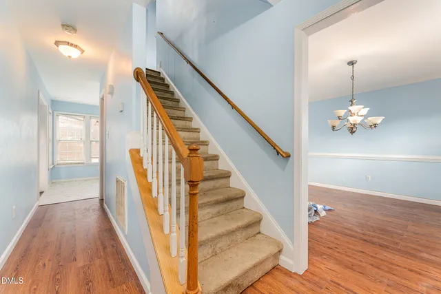 a view of entryway with wooden floor