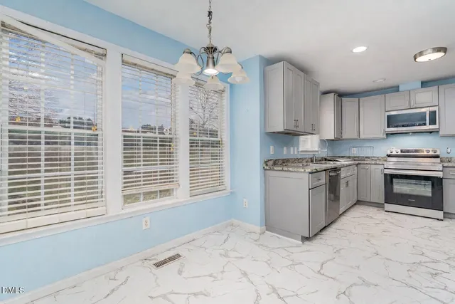 a bathroom with a bathtub and a sink