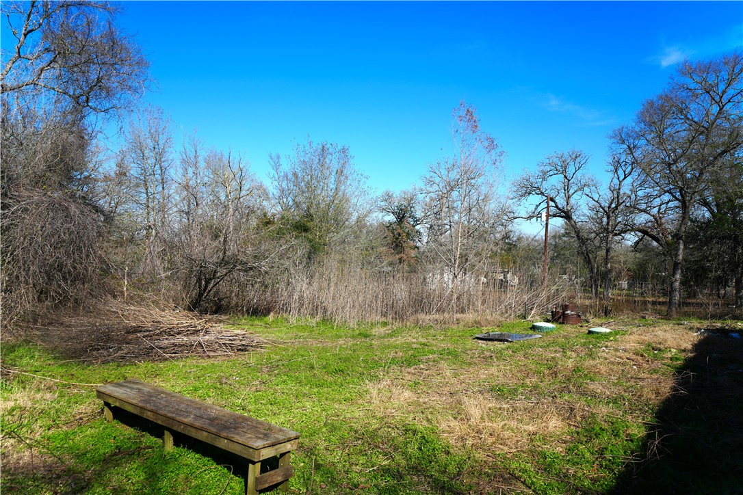 2552 Barnes Road Bryan, TX 77807 - Photo 3 of 14 View of yard with sprinklers