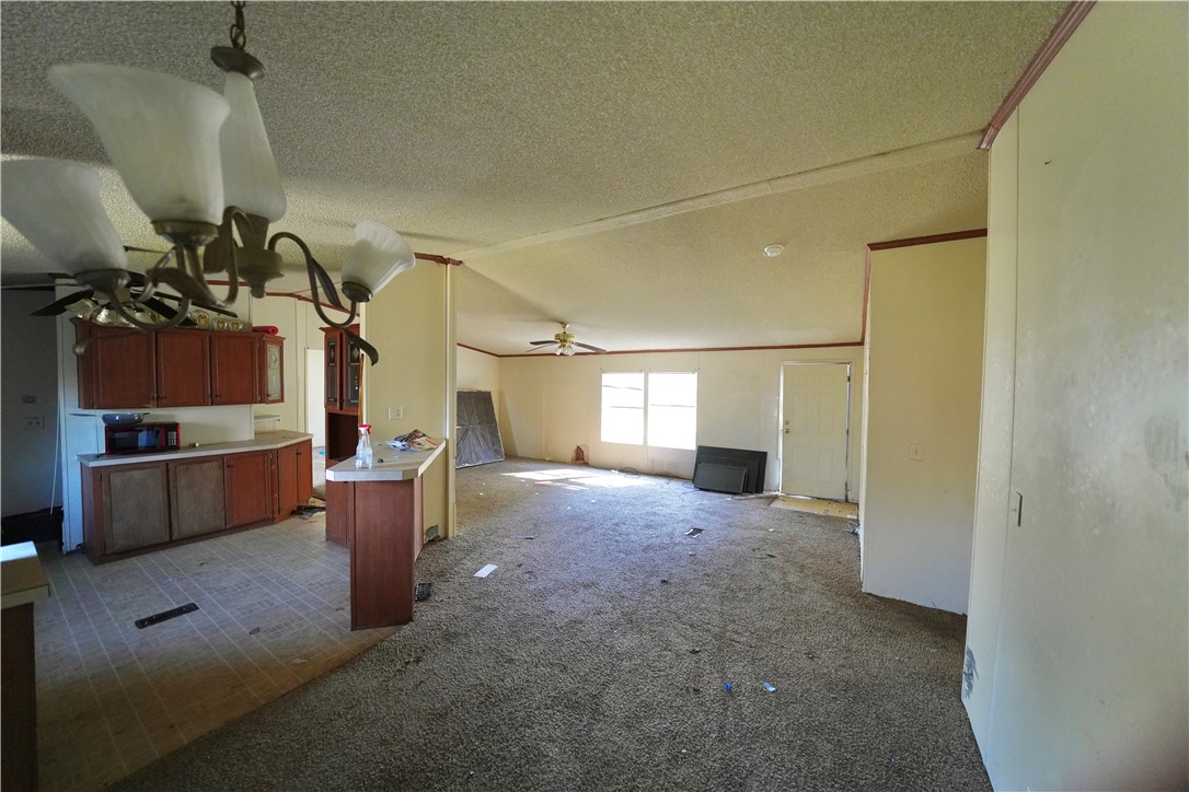 2552 Barnes Road Bryan, TX 77807 - Photo 4 of 14 View of dining, living, and kitchen spaces