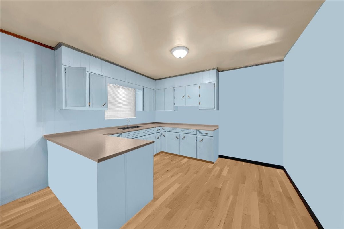 646 Main Street Altamont, TN 37301 - Photo 12 of 39 a room with wooden floor and cabinets