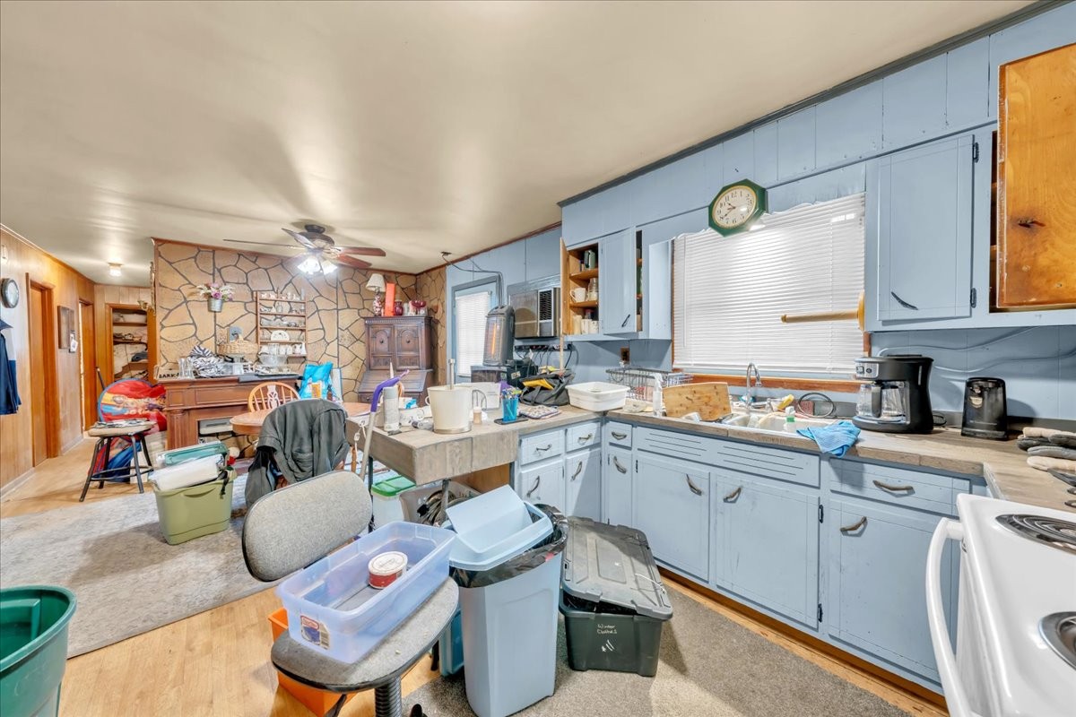 646 Main Street Altamont, TN 37301 - Photo 15 of 39 a kitchen that has a lot of cabinets a sink and appliances in it