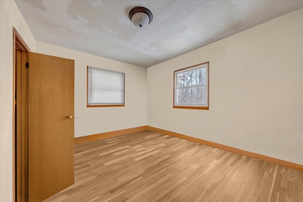 646 Main Street Altamont, TN 37301 - Photo 20 of 39 a view of an empty room with wooden floor