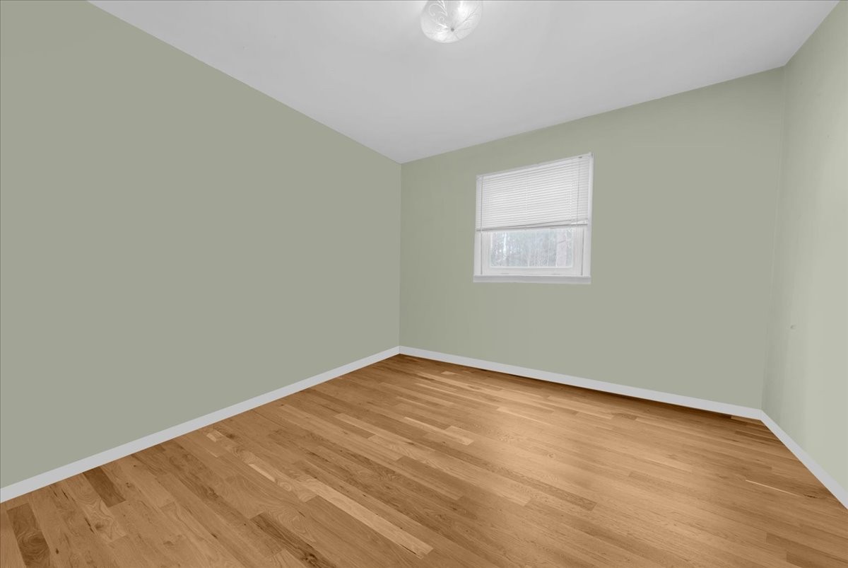 646 Main Street Altamont, TN 37301 - Photo 24 of 39 an empty room with a window