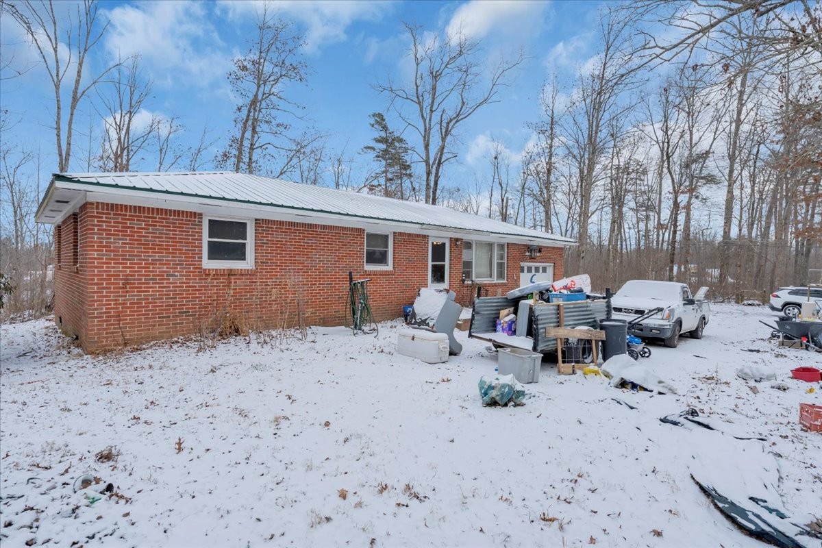 646 Main Street Altamont, TN 37301 - Photo 28 of 39 a view of a chair and table in the backyard