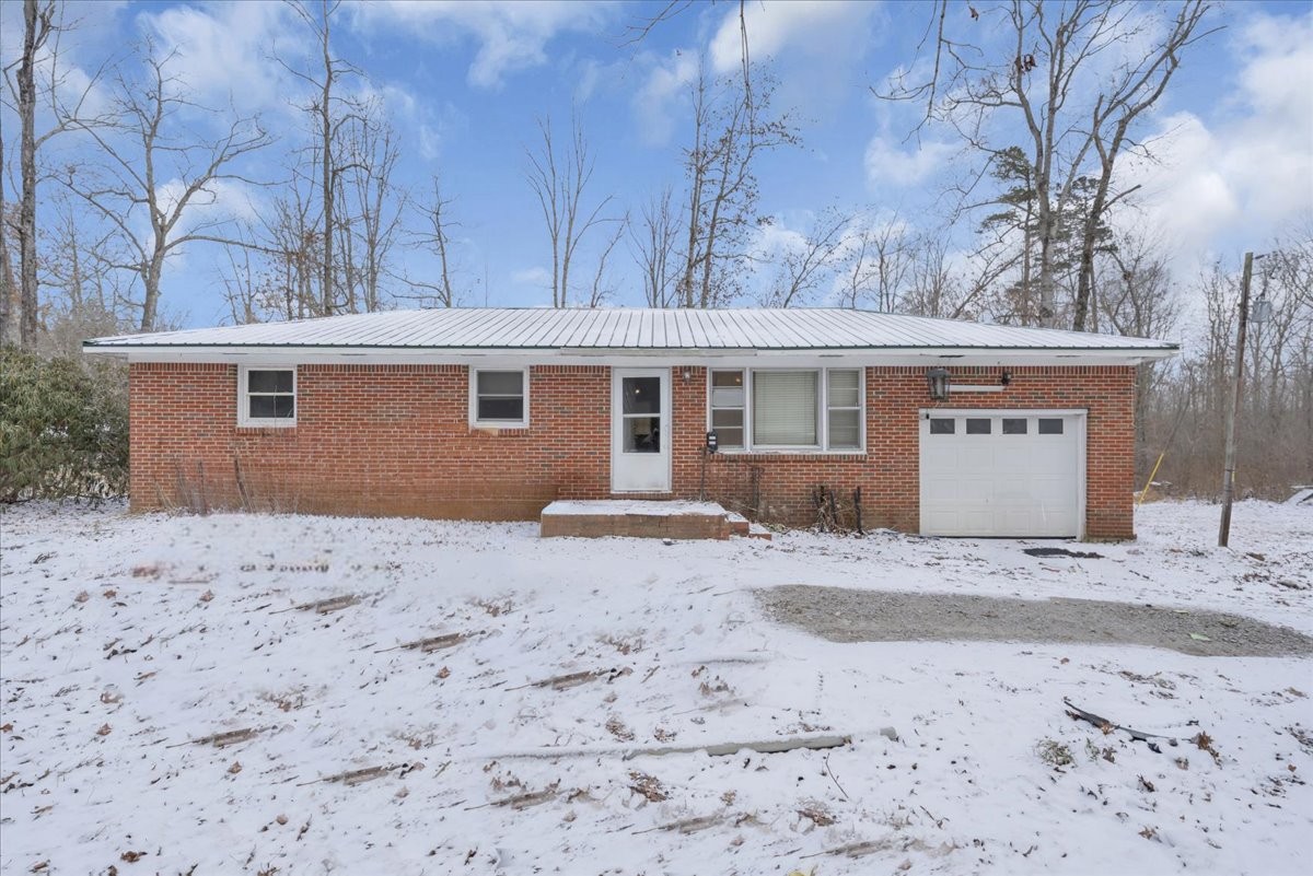 646 Main Street Altamont, TN 37301 - Photo 38 of 39 a view of a house with a snow on the wall