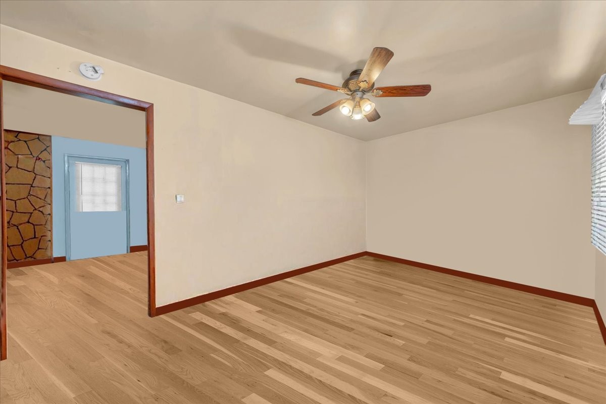 646 Main Street Altamont, TN 37301 - Photo 4 of 39 a view of an empty room with wooden floor