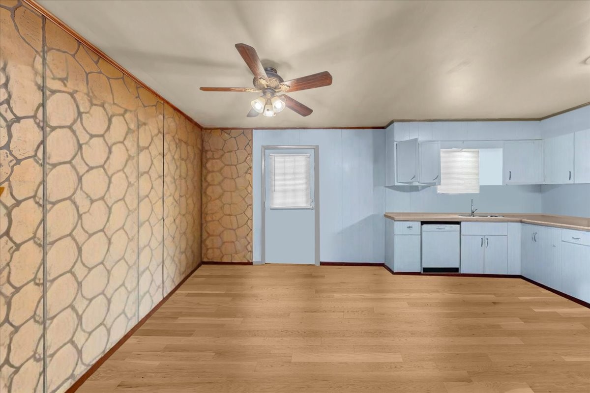 646 Main Street Altamont, TN 37301 - Photo 8 of 39 a view of empty room with wooden floor and fan