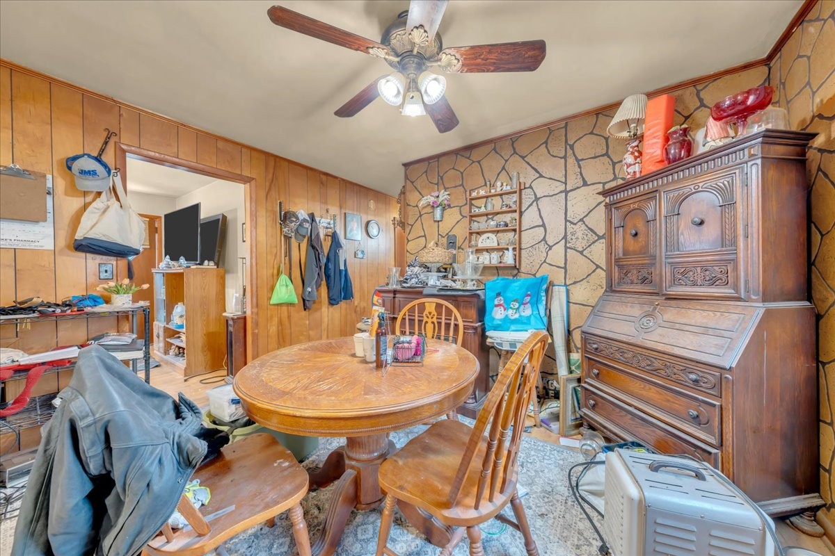 646 Main Street Altamont, TN 37301 - Photo 9 of 39 a dining room with furniture and a chandelier