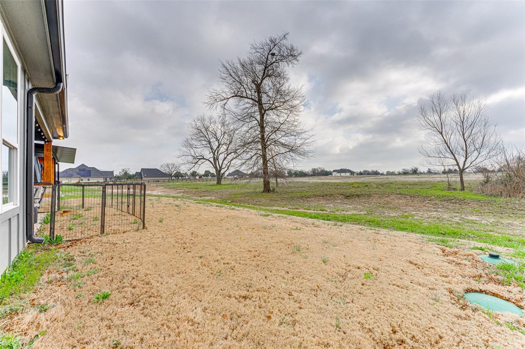 3167 County Road 1076 Celeste, TX 75423 - Photo 25 of 26 a view of a lake with houses in back