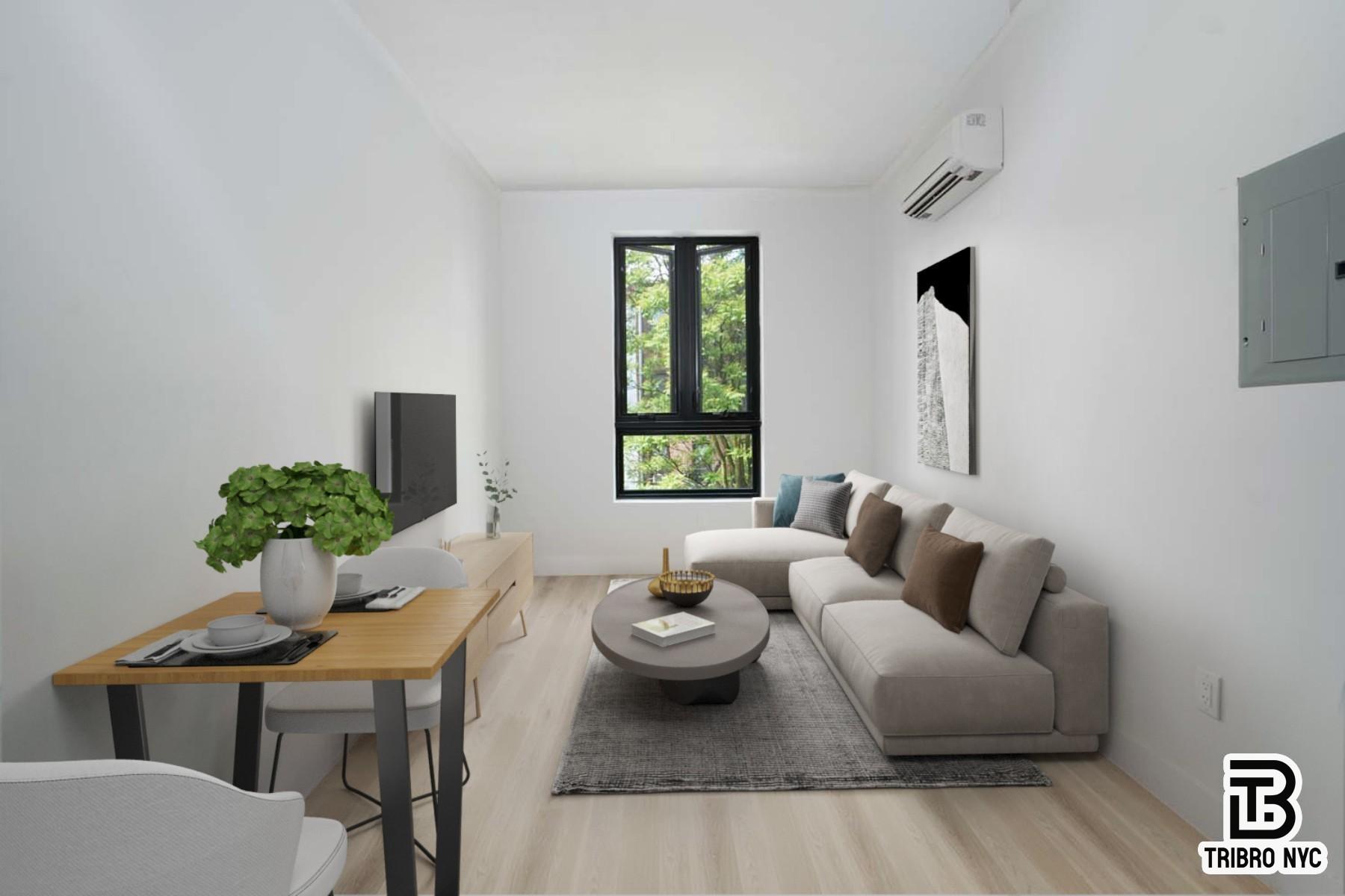 a living room with furniture and a window