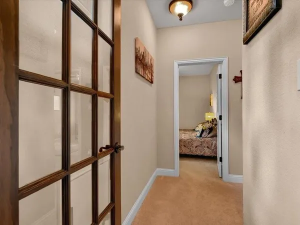 a kitchen with a stove and a refrigerator