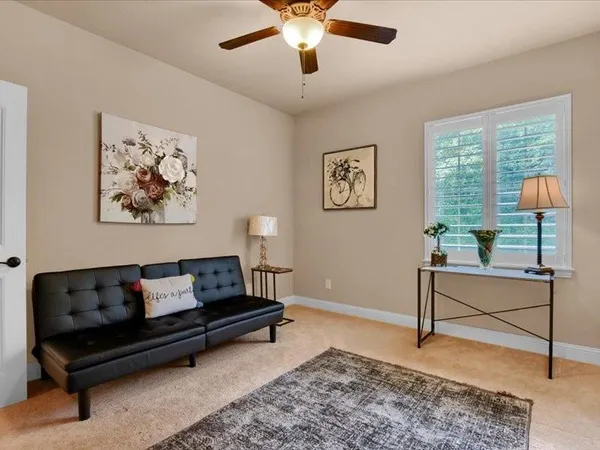a view of a livingroom with a workspace