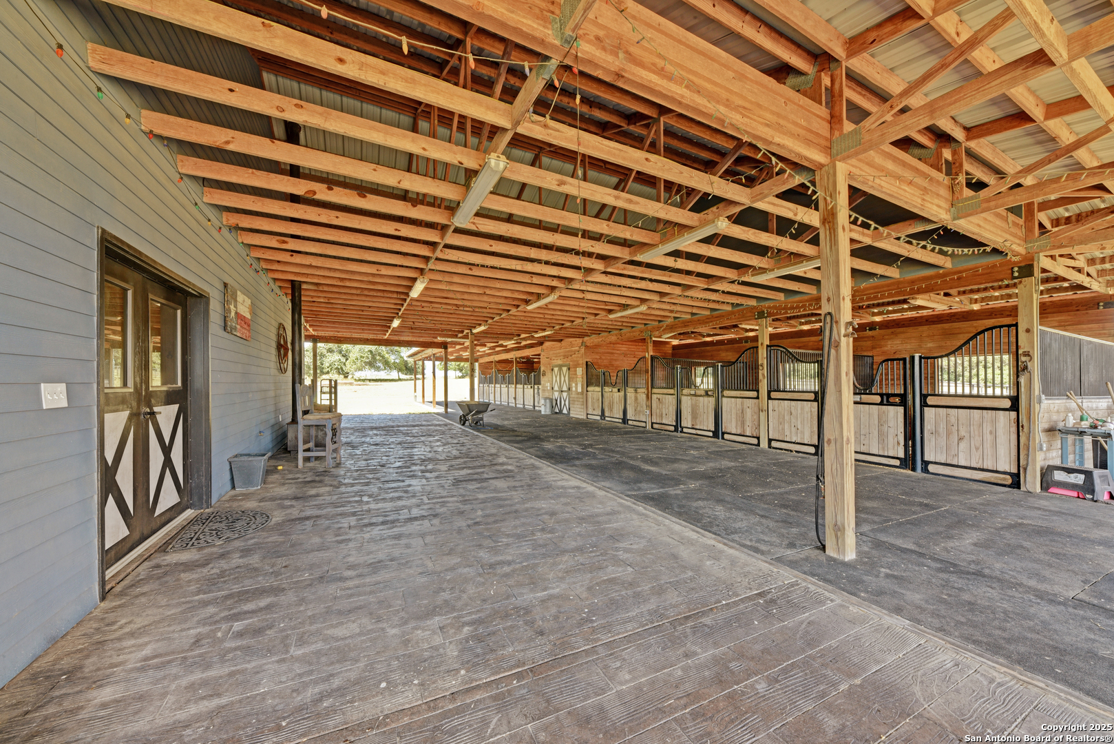 9560 Old Colony Line Road Dale, TX 78616 - Photo 30 of 41 a view of a porch with a table and chairs