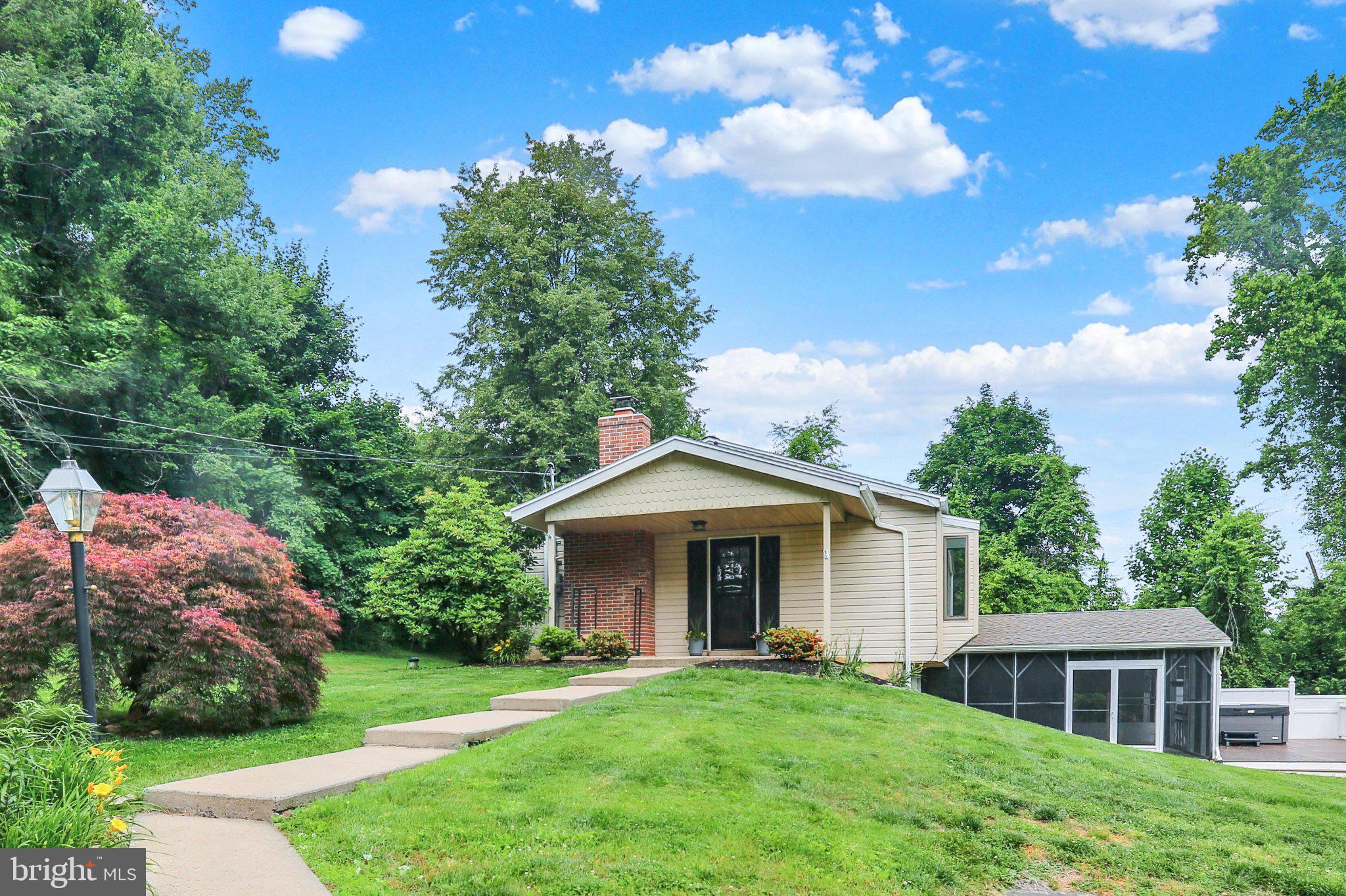 851 Cadmus Road Pottstown, PA 19465 - Photo 1 of 51 Charming home nestled in lush greenery.