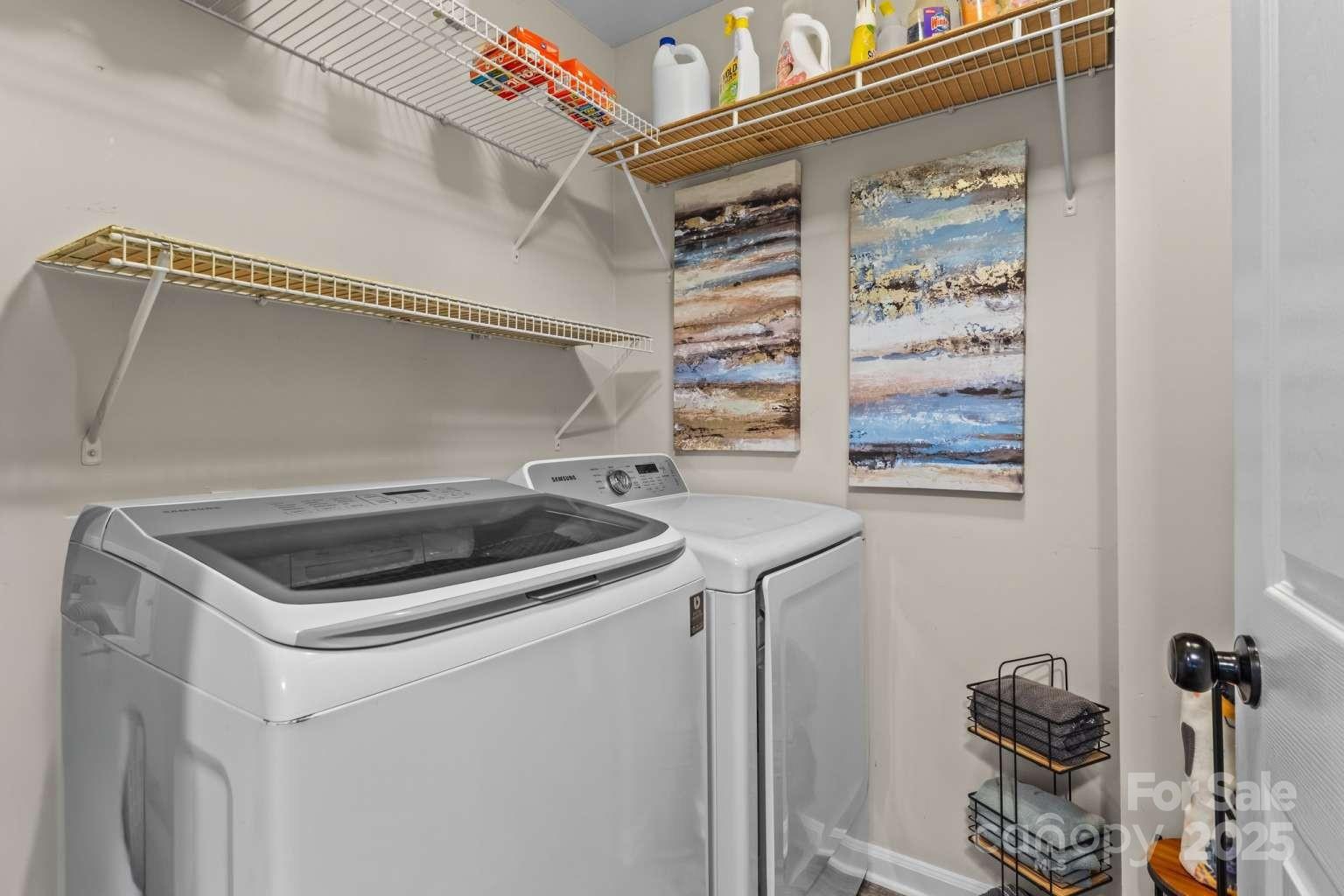7828 Dunoon Lane Charlotte, NC 28269 - Photo 25 of 39 a utility room with dryer and washer