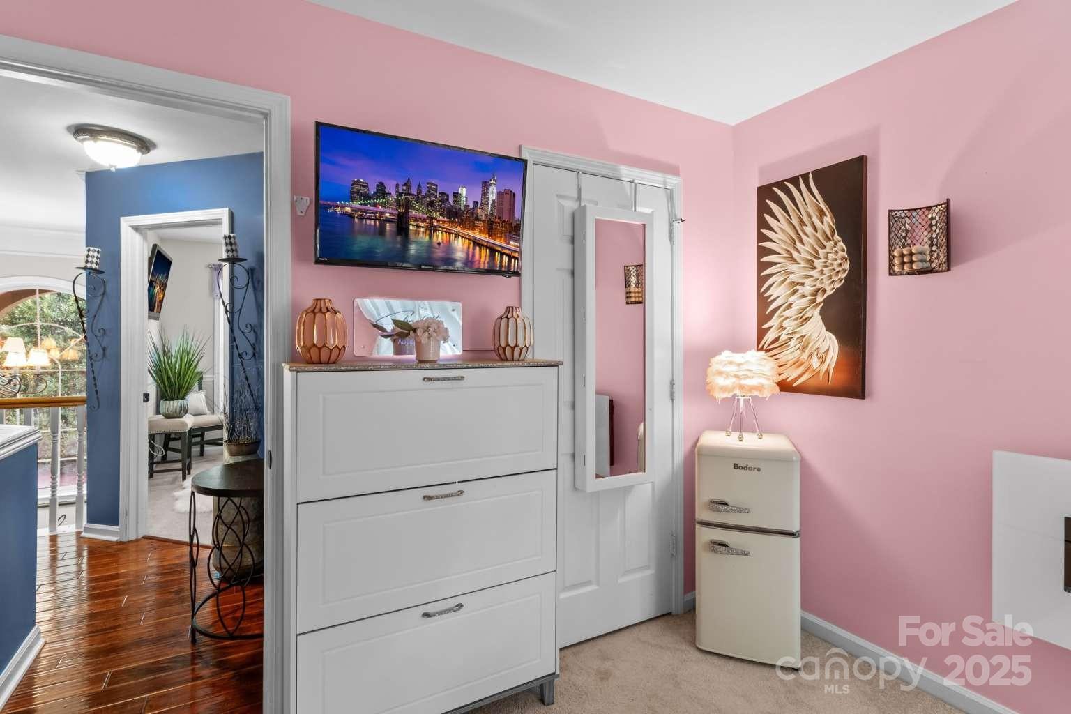 7828 Dunoon Lane Charlotte, NC 28269 - Photo 29 of 39 a room with cabinets and wooden floor