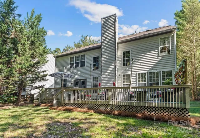 a view of swimming pool with a yard